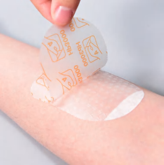 Medicazione trasparente con rivestimento a griglia alta